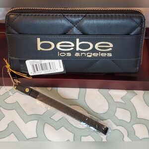 Bebe Black Zippered Wallet with Gold Accents